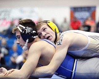 Crestview's Isaac Ricketts tries to pin down Jackson Milton's Anthony Pizzuto during the Jackson-Milton Invitational finals on Saturday. EMILY MATTHEWS | THE VINDICATOR