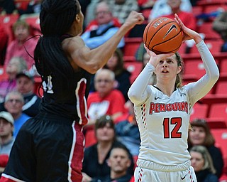 YOUNGSTOWN, OHIO JANUARY 5, 2019: Youngstown State's Chelsea Olson shoots a three point shot over IUPUI's Tamya Sims during the first half of their game, Saturday afternoon at Beeghly Center. Youngstown State won 70-52. DAVID DERMER | THE VINDICATOR