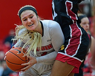 YOUNGSTOWN, OHIO JANUARY 5, 2019: Youngstown State's Alison Smolinski drives on IUPUI's Tamya Sims during the first half of their game, Saturday afternoon at Beeghly Center. Youngstown State won 70-52. DAVID DERMER | THE VINDICATOR