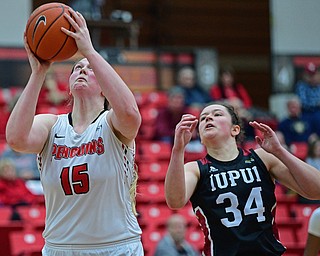 YOUNGSTOWN, OHIO JANUARY 5, 2019: Youngstown State's Mary Dunn goes to the basket after getting behind IUPUI's Katelyn O'Reilly during the first half of their game, Saturday afternoon at Beeghly Center. Youngstown State won 70-52. DAVID DERMER | THE VINDICATOR