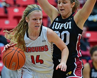 YOUNGSTOWN, OHIO JANUARY 5, 2019: Youngstown State's Melinda Trimmer drives on IUPUI's Agatha Beier during the first half of their game, Saturday afternoon at Beeghly Center. Youngstown State won 70-52. DAVID DERMER | THE VINDICATOR