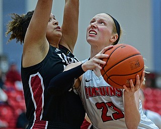 YOUNGSTOWN, OHIO JANUARY 5, 2019: Youngstown State's Sarah Cash goes to the basket against IUPUI's Macee Williams during the second half of their game, Saturday afternoon at Beeghly Center. Youngstown State won 70-52. DAVID DERMER | THE VINDICATOR