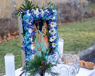 A portrayal of Jesus on water is displayed at the Blessing of the Waters Service by the Eastern Orthodox Clergy Association of Mahoning County at Lake Glacier in Mill Creek Park on Sunday afternoon. EMILY MATTHEWS | THE VINDICATOR