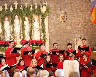 The St. John's Choir performs during the Boar's Head and Yule Log Festival at St. John's Episcopal Church on Sunday afternoon. EMILY MATTHEWS | THE VINDICATOR