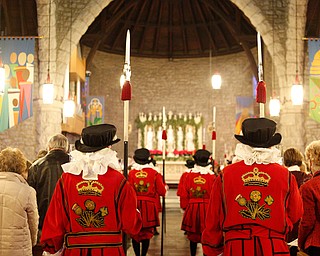 The beefeaters stand in the middle aisle of the church during the Boar's Head and Yule Log Festival at St. John's Episcopal Church on Sunday afternoon. EMILY MATTHEWS | THE VINDICATOR