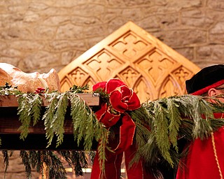 The boar's head is carried into the church during the Boar's Head and Yule Log Festival at St. John's Episcopal Church on Sunday afternoon. EMILY MATTHEWS | THE VINDICATOR