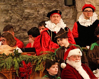 The boar's head is displayed on an alter during the Boar's Head and Yule Log Festival at St. John's Episcopal Church on Sunday afternoon. EMILY MATTHEWS | THE VINDICATOR