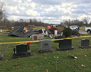 .HereÕs What is left of the cemetery storage building at hillside cemetery after Highwinds or a tornado blew through this morning. kris parke the bazettaa Township Road superintendent said he believes about 50 trees were also knocked over in the cemetery..