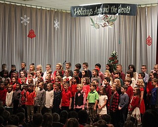 Neighbors | Abby Slanker.Hilltop Elementary School second-grade students, under the direction of Hilltop Music Director Stephanie Summers, performed the school’s annual Holidays Around the World Program on Dec. 18.