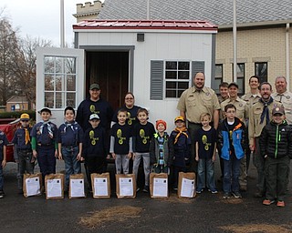 Neighbors | Abby Slanker.Members of Cub Scout Pack 25 collected donations for their first food drive to benefit Operation Blessing at the Canfield United Methodist Church.