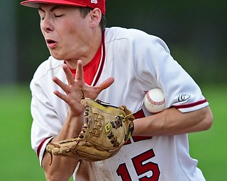 STRUTHERS, OHIO - MAY 15, 2018: Niles' Luke Swauger fields the ball before throwing it to first for the final out in the seventh inning to defeat Poland on Tuesday afternoon at Cene Park. Niles won 4-3. DAVID DERMER | THE VINDICATOR
