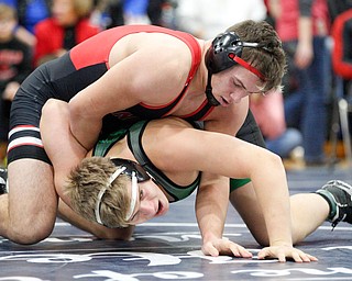 West Branch's Kenny Marra and Canfield's Nick Crawford at the EOWL wrestling finals at Austintown Fitch High School on Saturday afternoon. EMILY MATTHEWS | THE VINDICATOR