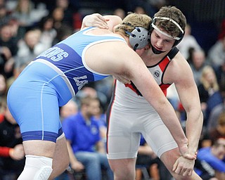 Canfield's Tyler Stein, right, and Louisville's Blake Robbins wrestle during the EOWL wrestling finals at Austintown Fitch High School on Saturday afternoon. Stein placed first in the 220 weight class. EMILY MATTHEWS | THE VINDICATOR