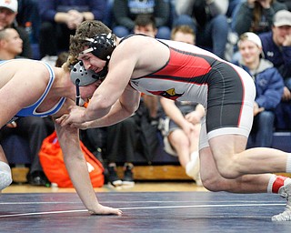 Canfield's Tyler Stein, right, and Louisville's Blake Robbins wrestle during the EOWL wrestling finals at Austintown Fitch High School on Saturday afternoon. Stein placed first in the 220 weight class. EMILY MATTHEWS | THE VINDICATOR