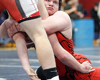 Girard's Jack Delgarbino and Beaver Local's Daniel Wirth at the EOWL wrestling finals at Austintown Fitch High School on Saturday afternoon. EMILY MATTHEWS | THE VINDICATOR