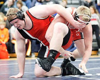 Girard's Jack Delgarbino and Beaver Local's Daniel Wirth at the EOWL wrestling finals at Austintown Fitch High School on Saturday afternoon. EMILY MATTHEWS | THE VINDICATOR