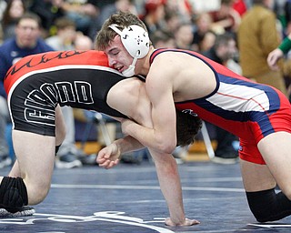 Austintown Fitch's Zach Richards, right, and Girard's Alex Delgarbino wrestle during the EOWL wrestling finals at Austintown Fitch High School on Saturday afternoon. Richards placed first in the 132 weight class. EMILY MATTHEWS | THE VINDICATOR