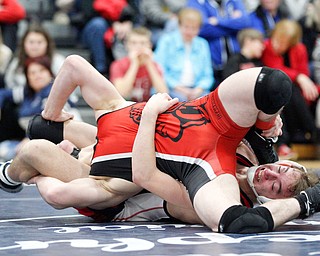 Austintown Fitch's Zach Richards, right, and Girard's Alex Delgarbino wrestle during the EOWL wrestling finals at Austintown Fitch High School on Saturday afternoon. Richards placed first in the 132 weight class. EMILY MATTHEWS | THE VINDICATOR