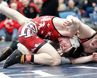 Beaver Local's Brenden Severs and Canfield's David Reinhart at the EOWL wrestling finals at Austintown Fitch High School on Saturday afternoon. EMILY MATTHEWS | THE VINDICATOR