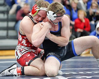 Beaver Local's Brenden Severs and Grand Valley's Clayton Takacs at the EOWL wrestling finals at Austintown Fitch High School on Saturday afternoon. EMILY MATTHEWS | THE VINDICATOR