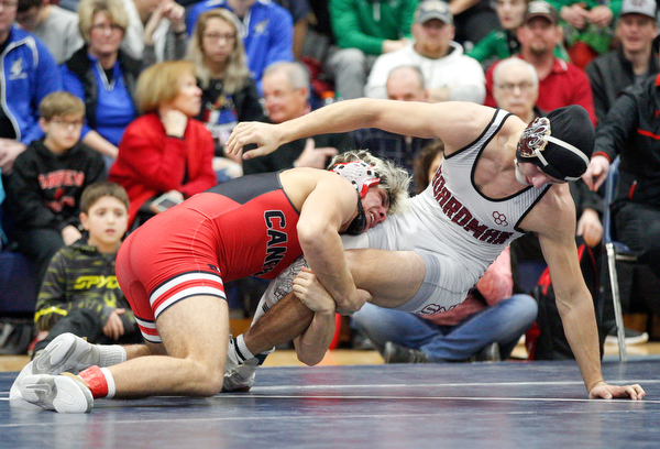 Canfield's Anthony D'Alesio and Boardman's Michael O'Horo at the EOWL wrestling finals at Austintown Fitch High School on Saturday afternoon. EMILY MATTHEWS | THE VINDICATOR