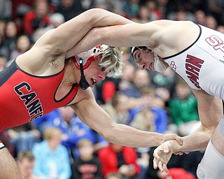 Canfield's Anthony D'Alesio and Boardman's Michael O'Horo at the EOWL wrestling finals at Austintown Fitch High School on Saturday afternoon. EMILY MATTHEWS | THE VINDICATOR