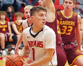 William D. Lewis The Vindicator Girard's Adam Connelly(1) looks to pass around Range's Nick Matos(22) during 1-15-19 action at Girard. In background is Range's Ben Irons(33).