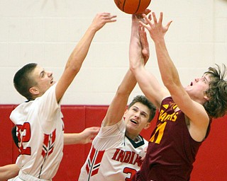 William D. Lewis The Vindicator  Giard's Christian Graziano(22) and Matt Payich(3) along with Range's Dante DiGaetano(11) battle for a rebound during 1-15-19 action at Girard.