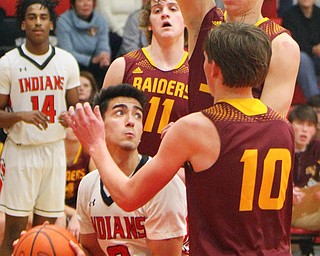 William D. Lewis The Vindicator Girard's Austin Claussell(2) is hemmed in by Range's Dante Gataeno(11), Ben Irons(33) and Chris Brooks(10 during 1-15-19 action in Girard.