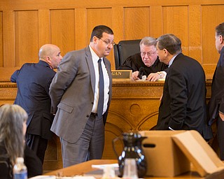 From left, Defense attorney David Rouzzo, Defense attorney John Cornely, Judge Andrew Logan, Trumbull County prosecutor Dennis Watkins, and Assistant Prosecutor Chris Becker meet while Claudia Hoerig sits to the left during her trial on Wednesday. EMILY MATTHEWS | THE VINDICATOR