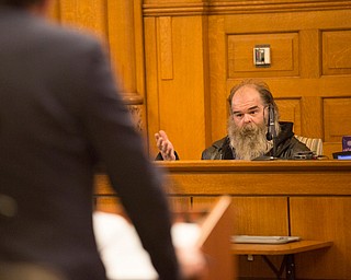Witness Richard Slider, who worked at a gun range and store, answers questions from Assistant Prosecutor Chris Becker during Claudia Hoerig's trial on Wednesday. EMILY MATTHEWS | THE VINDICATOR