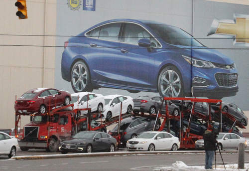 William D. Lewis The Vindicator A truck carrying new Cruzes leaves GM Lordstown plant 1-16-19.