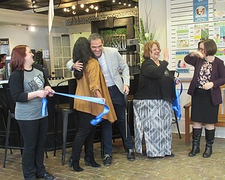 Neighbors | Jessica Harker.Pressed Coffee Bar and Eatery representatives, from left, Megan Shaw, Amy Tuscano, Frank Tuscano, Pamela Vonbergen and Aimee Fifarek, celebrated the opening of the new location in Poland on Jan. 10 with a ribbon cutting ceremony.