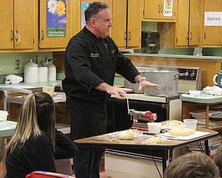 Neighbors | Abby Slanker.Jason Capps of Bella Sera in Pittsburgh visited Terri Dance’s expressive arts food class at Canfield Village Middle School to demonstrate to the students how make a pasta dish on Dec. 4.