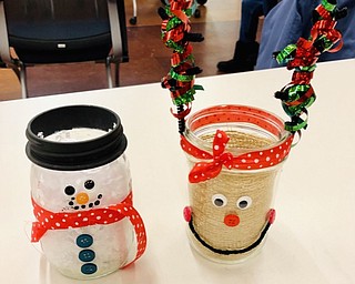 Neighbors | Submitted.Using supplies provided by the Michael Kusalaba library community members created unique mason jar designs during the first DIY Festive Mason Jar event.