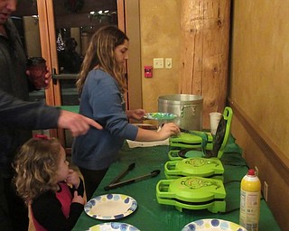 Neighbors | Jessica Harker.Boardman community members enjoyed green Grinch waffles Dec. 19 at the park's annual Cookies with Santa event.