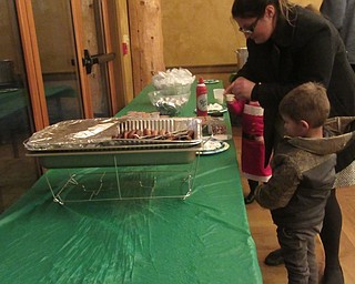Neighbors | Jessica Harker.A full breakfast for dinner meal of sausage, waffles and more was available to residents of Boardman who attended Boardman Park's annual Cookies with Santa event Dec. 19.
