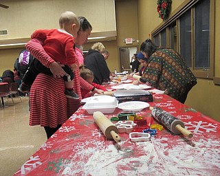 Neighbors | Jessica Harker.Community members were able to roll, cut out, bake and decorate their own cookies for Santa Claus Dec. 19 at the Boardman Park's annual Cookies with Santa event.