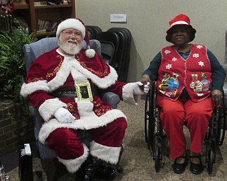 Neighbors | Jessica Harker.Santa Claus visited residents of Beeghly Oaks on Dec. 19, posing with Jean White during the center's annual holiday party.