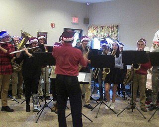 Neighbors | Jessica Harker.Members of the wind ensemble at Boardman High School traveled to Beeghly Oaks to help residents celebrate their annual holiday party.