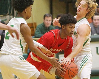 William D. Lewis The Vindicator  Chaney's (3) is cornered by Ursulines (2) and (4) Ursuline's during 1-18-19 action at Ursuline.