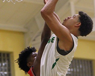 William D. Lewis The Vindicator Ursilines(0) shoots over Chaney's (25)during 1-18-19 action at Ursuline.