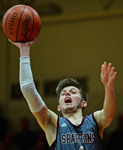 CANFIELD, OHIO - JANUARY 18, 2019: Boardman's Tommy Fryda puts up a shot during the second half of their game, Friday night at Canfield High School. DAVID DERMER | THE VINDICATOR