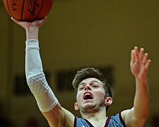 CANFIELD, OHIO - JANUARY 18, 2019: Boardman's Tommy Fryda puts up a shot during the second half of their game, Friday night at Canfield High School. DAVID DERMER | THE VINDICATOR