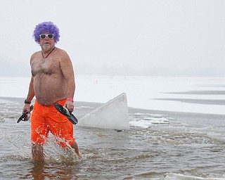 Mike Montler, who was with the group Livin' for Livi, participates in the Annual Polar Plunge in Mosquito Lake in Cortland on Saturday. EMILY MATTHEWS | THE VINDICATOR