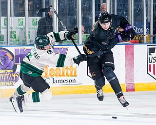 Scott R. Galvin | The Vindicator.Youngstown Phantoms forward Matthew DeMelis (9) skates around Cedar Rapids RoughRiders defenseman Adam Backehag (6) during the third period at the Covelli Centre on Saturday, January 19, 2019.  The Phantoms lost 4-2.