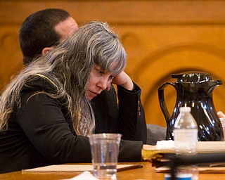 Claudia Hoerig listens to Assistant Prosecutor Chris Becker give his closing remarks during her trial on Wednesday. EMILY MATTHEWS | THE VINDICATOR