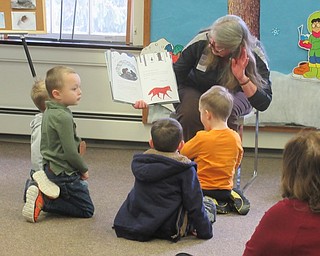 Neighbors | Jessica Harker.Naturalist Marilyn Williams read "Over and Under the Snow" to children gathered at the Little Explorers meeting Jan. 10.