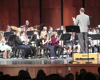 Neighbors | Jessica Harker.Assistant band director Michael Shevock instructed the fifth -grade band from Boardman Center Intermediate School on Jan. 9 for the school's winter concert.