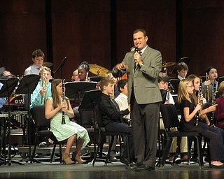 Neighbors | Jessica Harker.Michael Shevock, assistant band director at Boardman, directed fifth-grade students during the annual winter concert on Jan. 9.